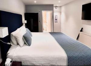 Кровать или кровати в номере Mode Hotel St Annes