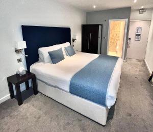 Кровать или кровати в номере Mode Hotel St Annes