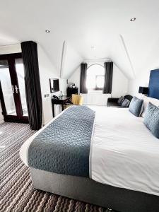 Кровать или кровати в номере Mode Hotel St Annes