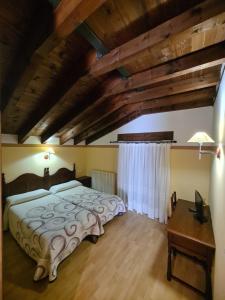 Postel nebo postele na pokoji v ubytování Hostal Las Nieves