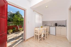 Kuchyň nebo kuchyňský kout v ubytování Pyrgaraki Studios and Apartments + 37 fotografií