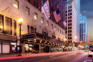 an empty street in a city at night at The Allegro Royal Sonesta Hotel Chicago Loop in Chicago