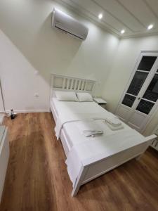Кровать или кровати в номере Lefkada Triola Apartments