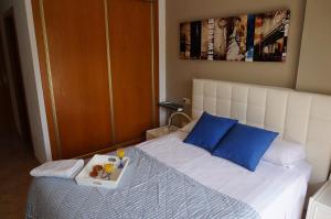 Łóżko lub łóżka w pokoju w obiekcie Apartamento Alcoy