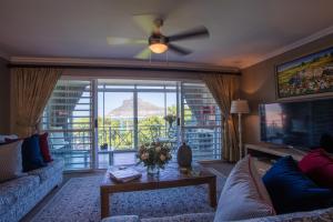 A seating area at dk villas 1 Harbour View Hout Bay