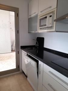 A kitchen or kitchenette at Carboneras - Holidays Time