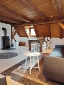 a living room with a table and a couch at Altstadt Appartements in Landsberg am Lech