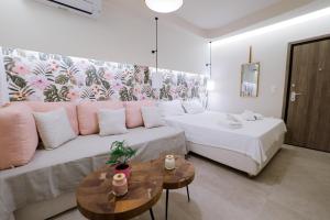 Postel nebo postele na pokoji v ubytování Loutraki Pinky Pearl