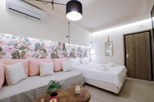 Postel nebo postele na pokoji v ubytování Loutraki Pinky Pearl
