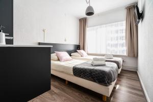 Postel nebo postele na pokoji v ubytování Bruist