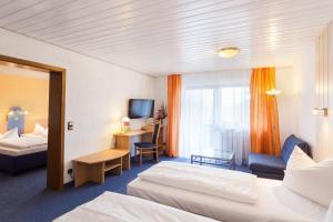 Postel nebo postele na pokoji v ubytování Akzent Hotel Alpenrose