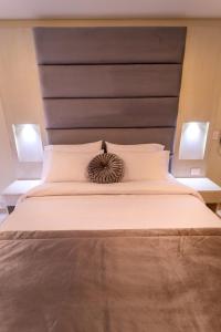 Postel nebo postele na pokoji v ubytování Trugo Luxury Rooms