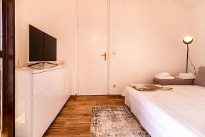 Posteľ alebo postele v izbe v ubytovaní Sunny beach apartment Lavica
