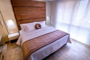 Postel nebo postele na pokoji v ubytování Trugo Luxury Rooms