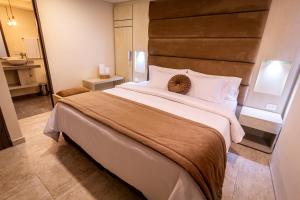 Postel nebo postele na pokoji v ubytování Trugo Luxury Rooms