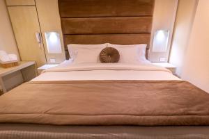 Postel nebo postele na pokoji v ubytování Trugo Luxury Rooms