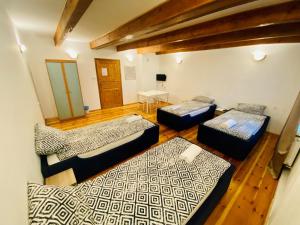 Posteľ alebo postele v izbe v ubytovaní Hostel Białystok Centrum