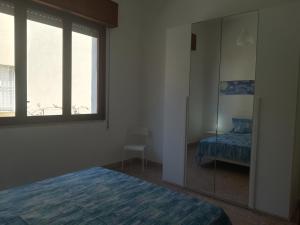 A bed or beds in a room at VillAmar