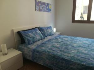 A bed or beds in a room at VillAmar