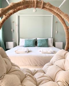 Bea Trees - Lake Garda tesisinde bir odada yatak veya yataklar