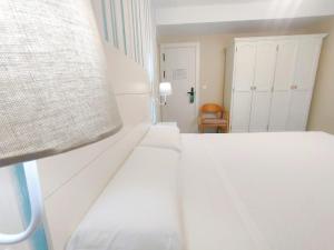 Cama o camas de una habitación en Rodeiramar 2A