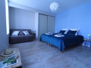 Llit o llits en una habitació de Le colibri bleu