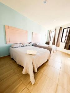 Postel nebo postele na pokoji v ubytování Hotel Hai Do + 34 fotografií