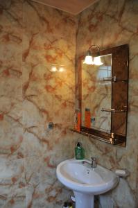 Ванна кімната в Guest House Ukimerioni