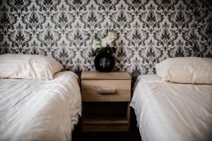 Postel nebo postele na pokoji v ubytování Hotel Le Provencal