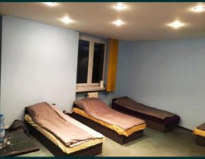 Posteľ alebo postele v izbe v ubytovaní Pokoje Gościnne Saritas