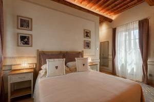 Posteľ alebo postele v izbe v ubytovaní Villa Svetoni Wine Resort