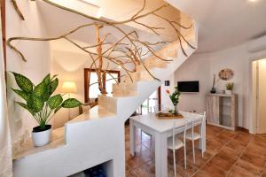 TV a/nebo společenská místnost v ubytování Residence Chiaro di Luna