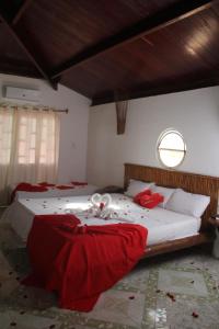 Cama o camas de una habitación en Pousada Paradiso Tropical