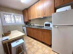 Kuchyň nebo kuchyňský kout v ubytování Apartamento Tortosa