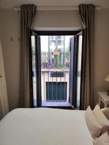 Posteľ alebo postele v izbe v ubytovaní Apartamento Premium en el Centro de Sevilla