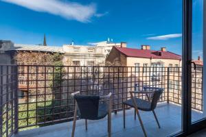 A balcony or terrace at Barnovi Boutique Hotel