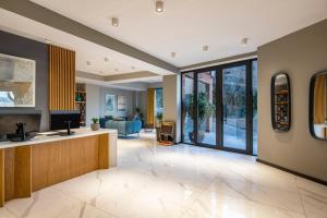 A kitchen or kitchenette at Barnovi Boutique Hotel