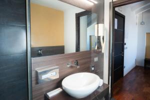 Koupelna v ubytování SIRIOHotel