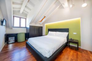 Postel nebo postele na pokoji v ubytování SIRIOHotel