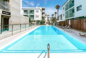 The swimming pool at or close to Elegant apartment next to the sea!