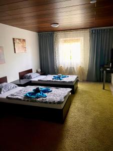 Postel nebo postele na pokoji v ubytování RIEDWIRTSHAUS