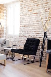 Posezení v ubytování Vailato Loft Suites