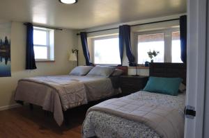 Ένα ή περισσότερα κρεβάτια σε δωμάτιο στο Homerhome