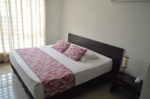 Postel nebo postele na pokoji v ubytování Hotel Mare Apartasuite