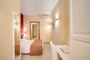 Voodi või voodid majutusasutuse Top Floor Navona toas