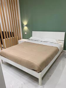 Posteľ alebo postele v izbe v ubytovaní Quattro Canti Suite Palermo