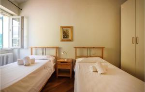 Posteľ alebo postele v izbe v ubytovaní Amazing Apartment In Imperia With Wifi