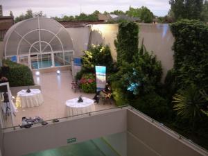 TV a/nebo společenská místnost v ubytování Hotel Diego De Almagro Talca