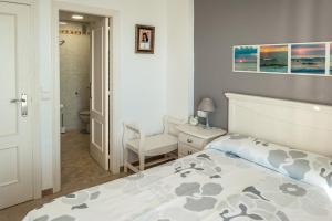 Posteľ alebo postele v izbe v ubytovaní PRIMERISIMA LINES DE PLAYA AP10 apartamento
