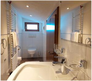 Ein Badezimmer in der Unterkunft Haus Moritz